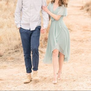 cape back dipped hem dress